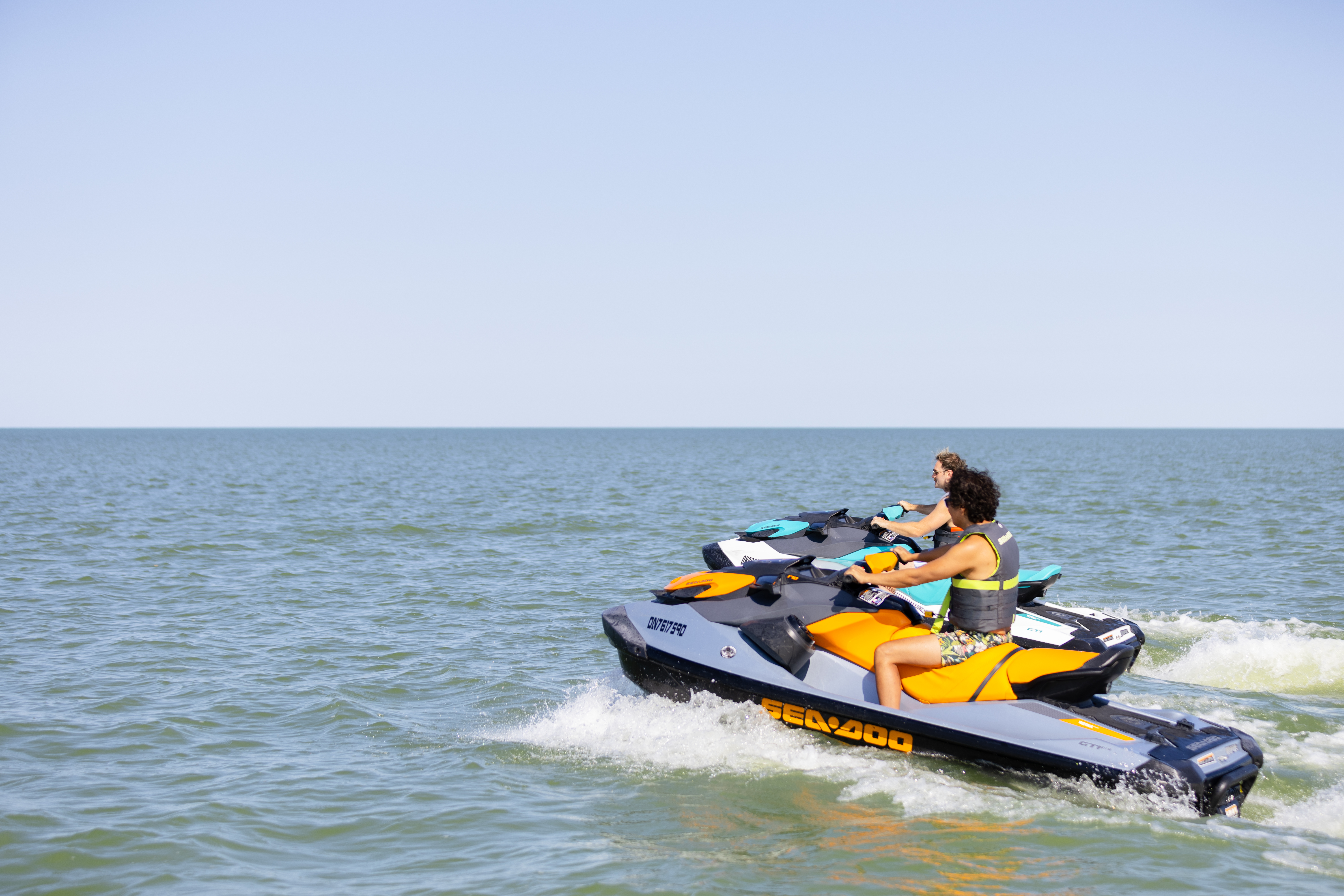 People jetskiing