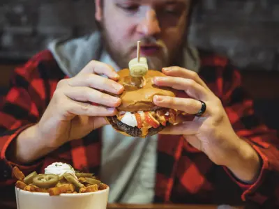 Person holding hamburger